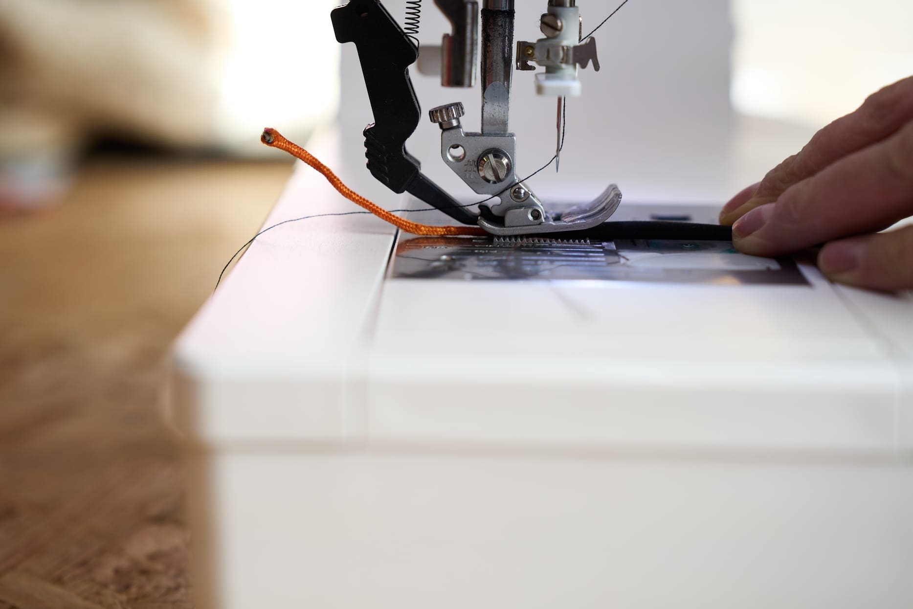 The foot and needle of a sewing machine