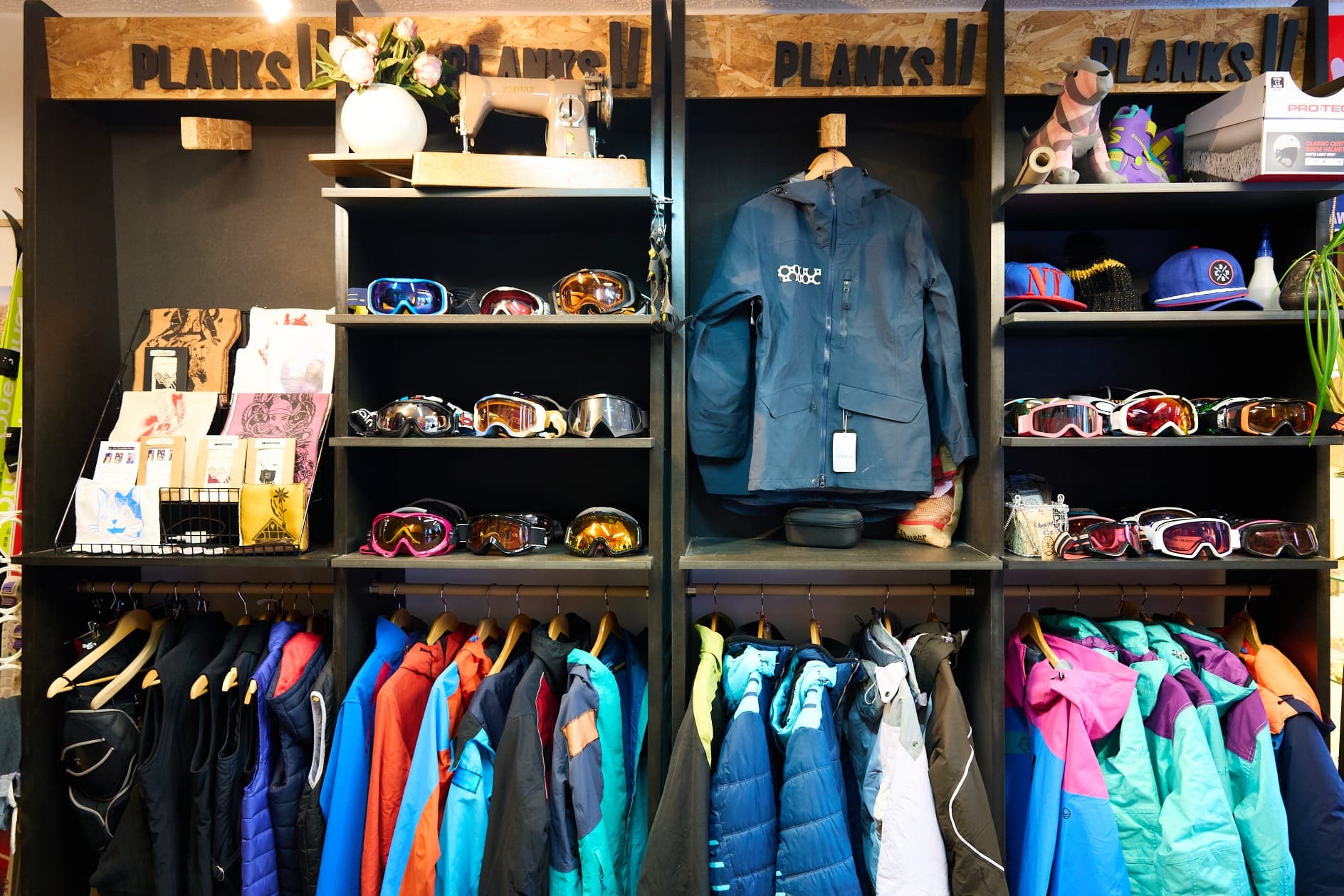 A range of One Tree clothes and goggles displayed in the shop