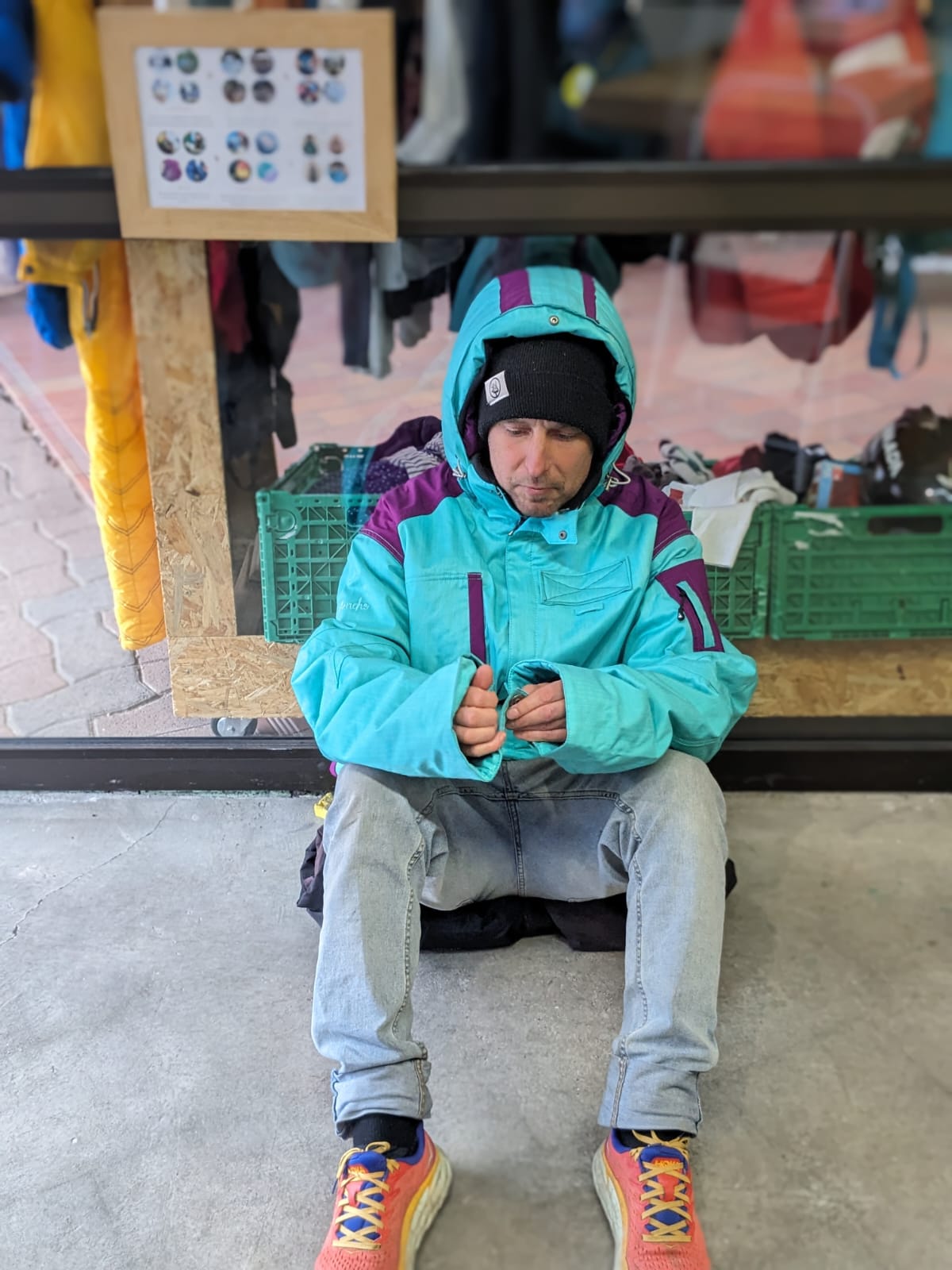 Gav sitting on rolled up trousers to test the design