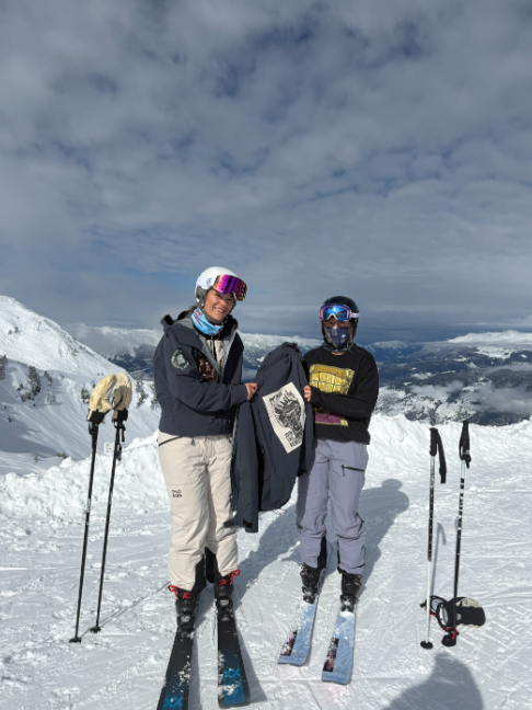 A Made to be Worn jacket being handed from one recipient to the next.