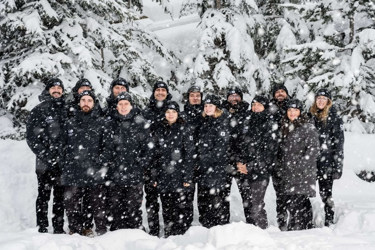 The WhiteStorm team photographed in a snowstorm